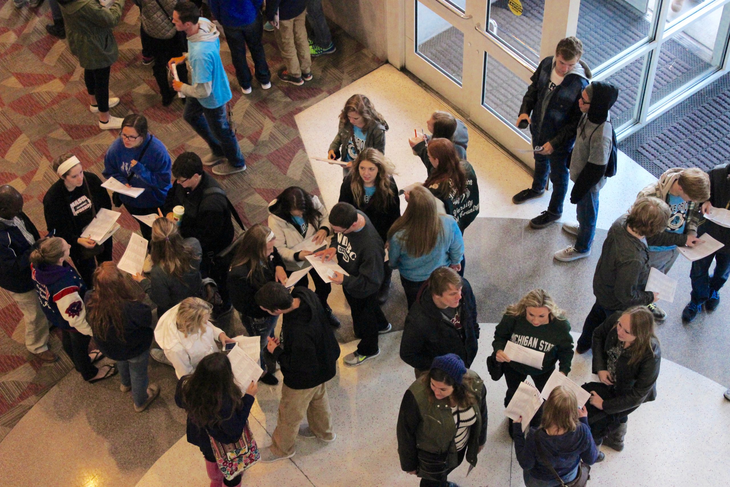 Students gather inside the doors of the Lansing Center for the MIPA Fall Conference.